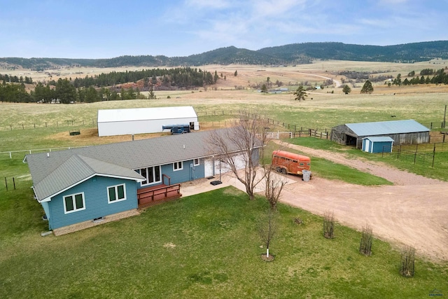 bird's eye view featuring a mountain view and a rural view