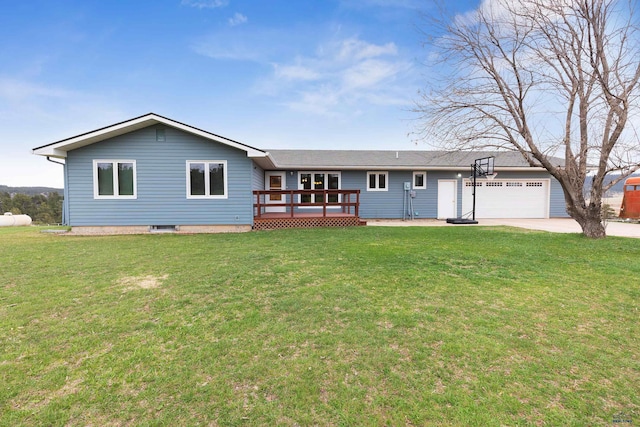 ranch-style house featuring a garage, a front lawn, and a deck