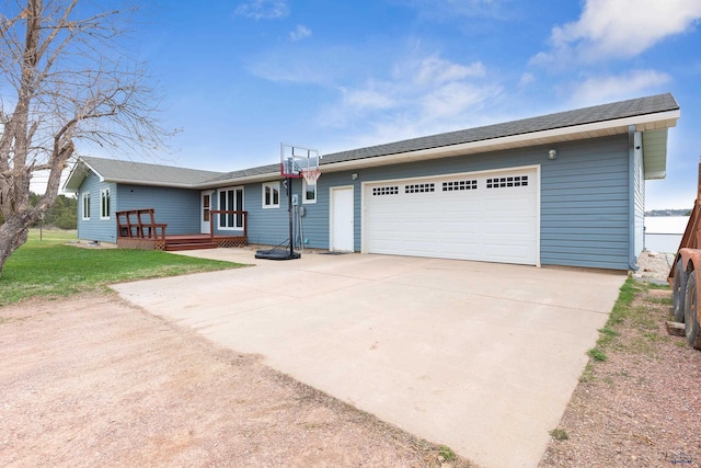 ranch-style home featuring a garage