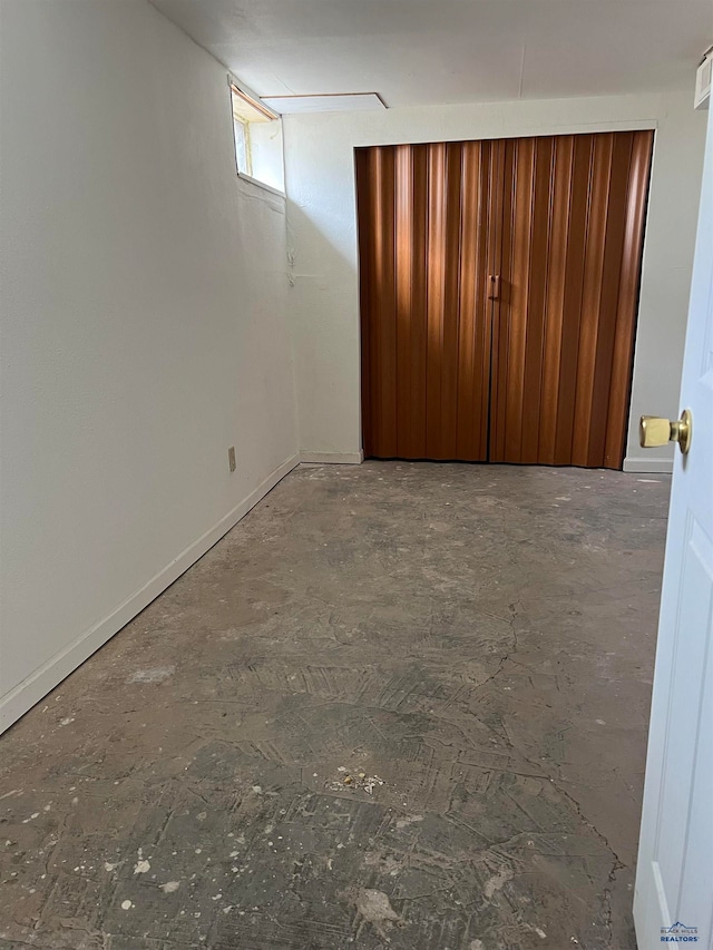 unfurnished bedroom featuring a closet