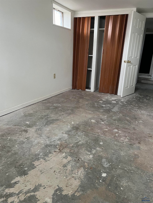 unfurnished bedroom featuring a closet