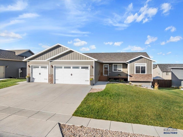 single story home featuring a garage and a front lawn