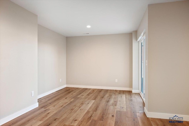 empty room featuring light hardwood / wood-style floors