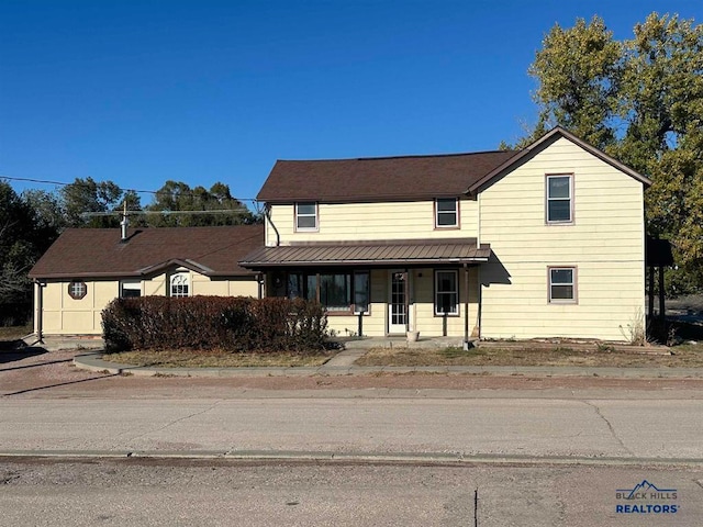 front of property featuring a porch