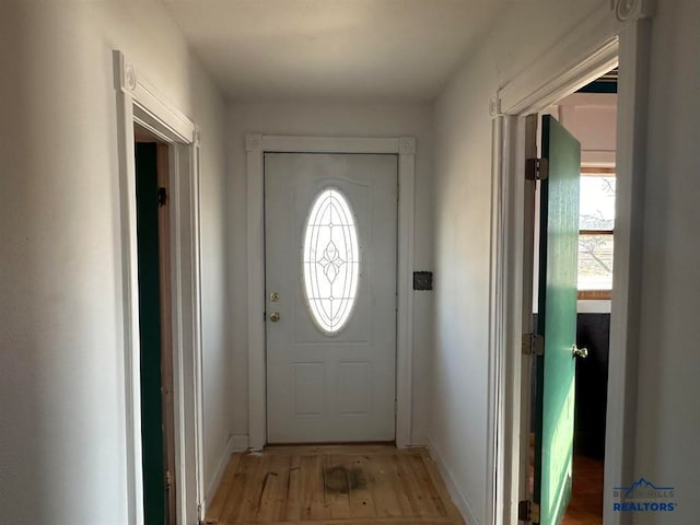 doorway with light hardwood / wood-style floors