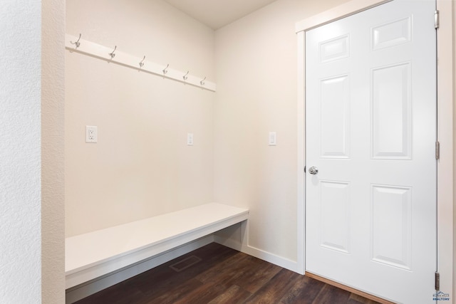 mudroom with dark wood-style floors and visible vents