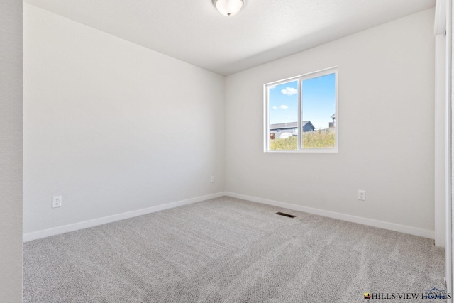 view of carpeted spare room