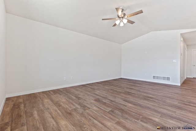 bonus room with lofted ceiling, hardwood / wood-style floors, and ceiling fan