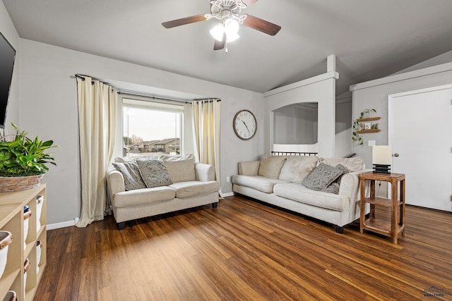 living room with lofted ceiling, dark wood-type flooring, and ceiling fan