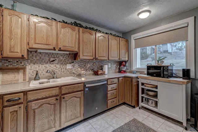 kitchen featuring decorative backsplash, stainless steel dishwasher, a textured ceiling, sink, and light tile patterned flooring