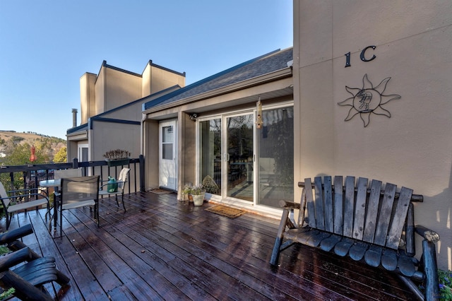 wooden terrace featuring a mountain view