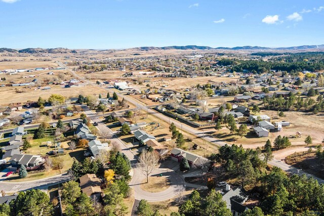 bird's eye view with a mountain view