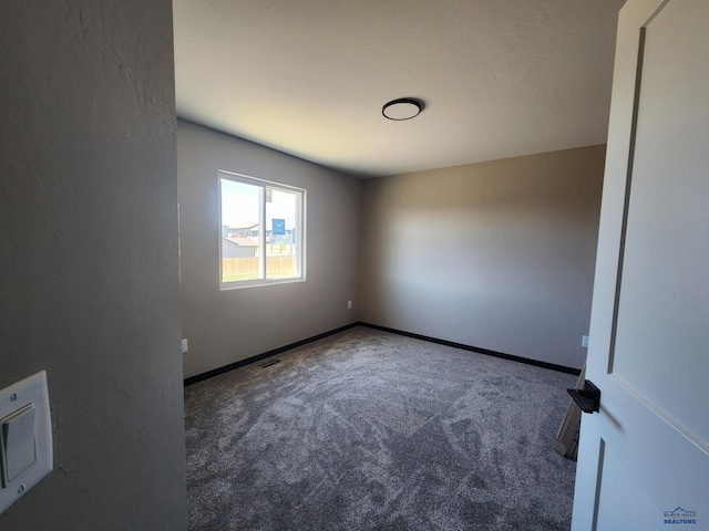 spare room with carpet flooring