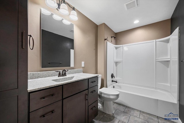 full bathroom with tile patterned flooring, vanity, toilet, and shower / bathtub combination