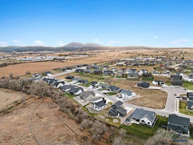 bird's eye view with a mountain view