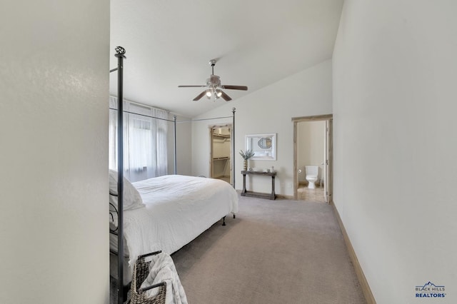 bedroom with a walk in closet, ceiling fan, carpet, and lofted ceiling