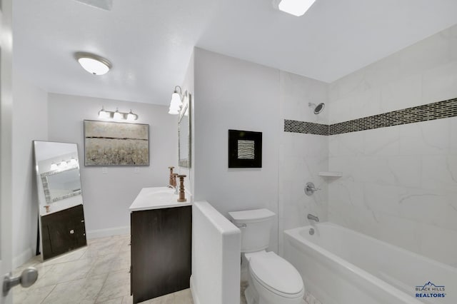 full bathroom featuring tile patterned floors, vanity, toilet, and tiled shower / bath combo