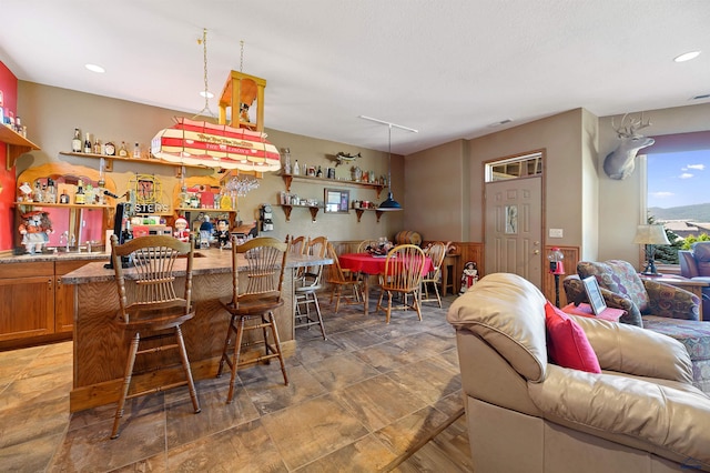 interior space featuring bar area