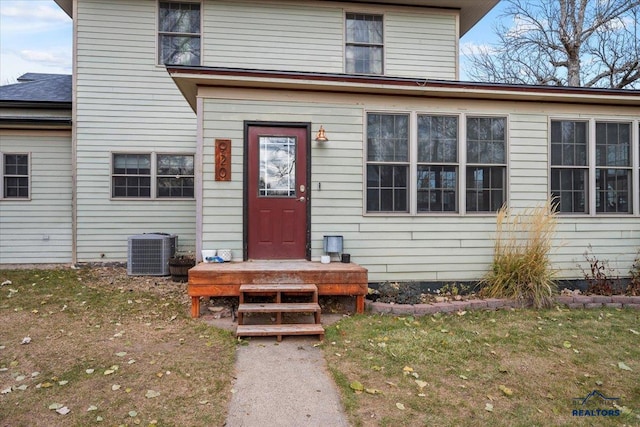 view of front of house featuring central air condition unit