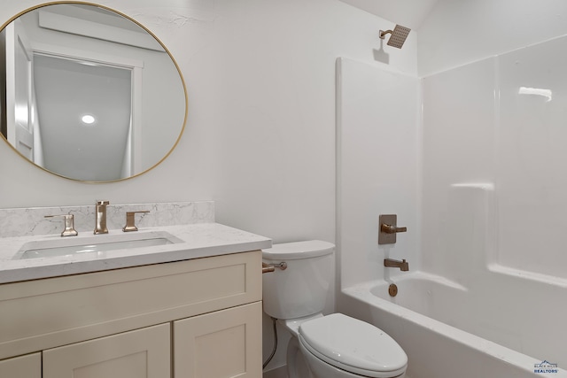 full bathroom with shower / bathing tub combination, vanity, toilet, and vaulted ceiling