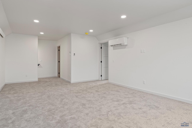 carpeted empty room with a wall mounted AC