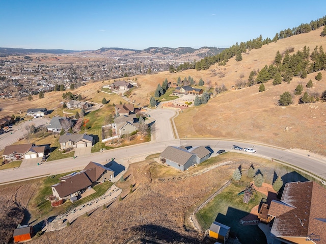 drone / aerial view featuring a mountain view