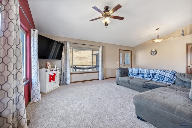 living room featuring carpet, vaulted ceiling, and ceiling fan