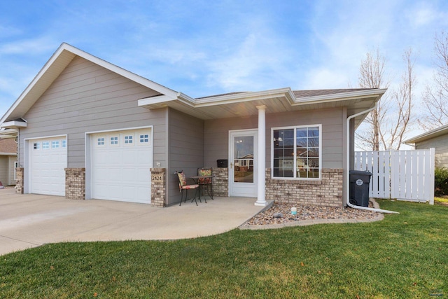 single story home featuring a front yard and a garage