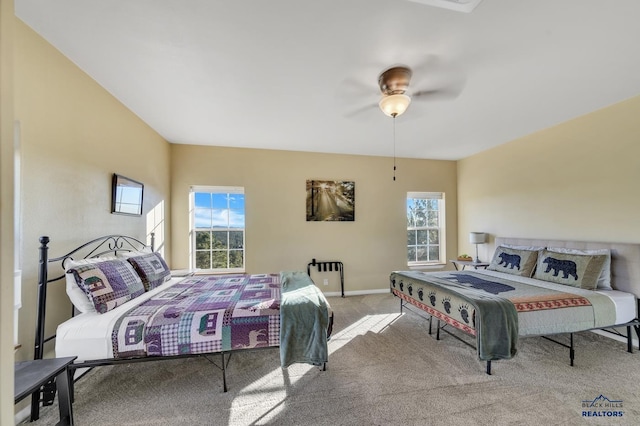 carpeted bedroom with ceiling fan