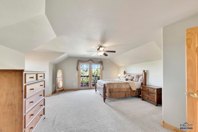 carpeted bedroom featuring ceiling fan, access to exterior, and lofted ceiling