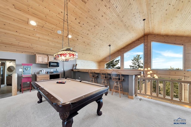 game room with bar area, light colored carpet, wood ceiling, and billiards