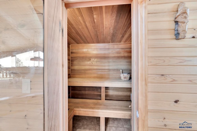 view of sauna featuring tile patterned floors