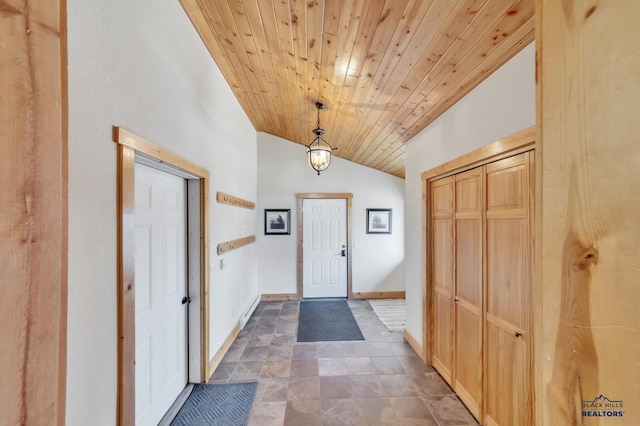 interior space with wooden ceiling and vaulted ceiling