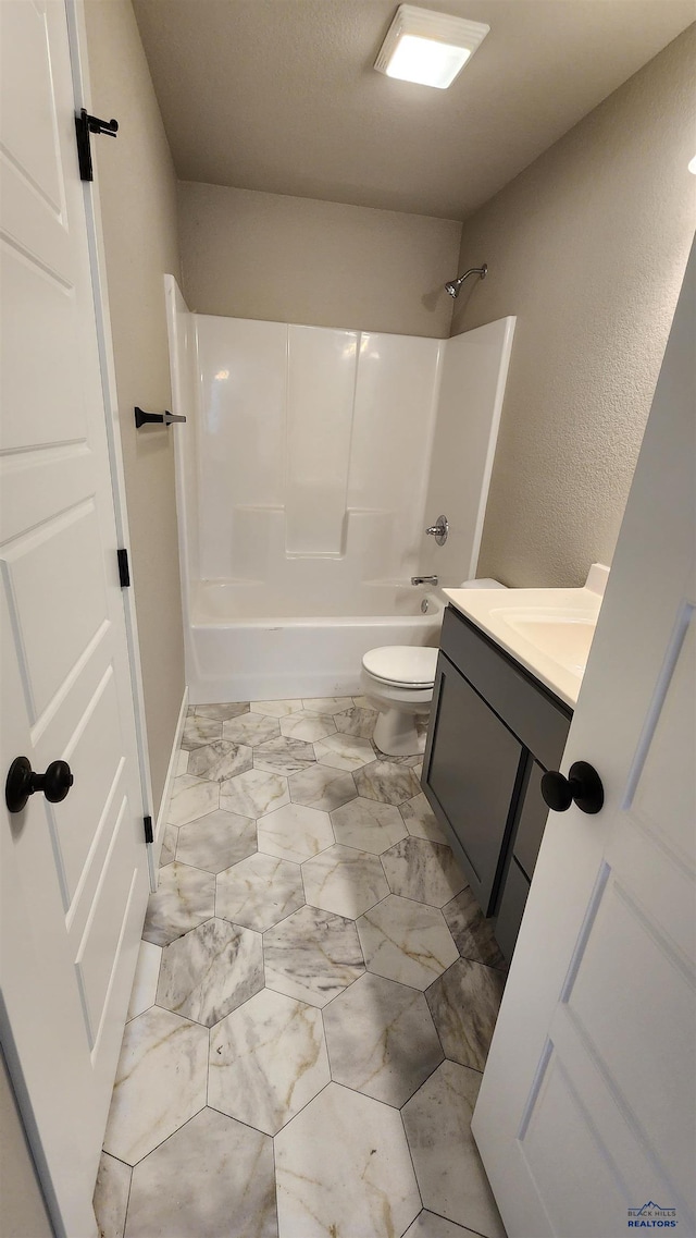 full bathroom featuring vanity, toilet, and shower / tub combination