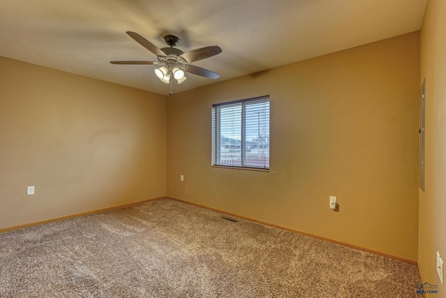 unfurnished room featuring carpet and ceiling fan