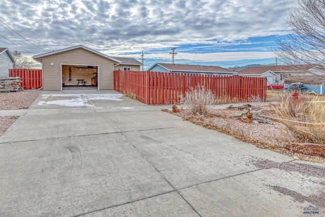 exterior space with an outdoor structure and a garage