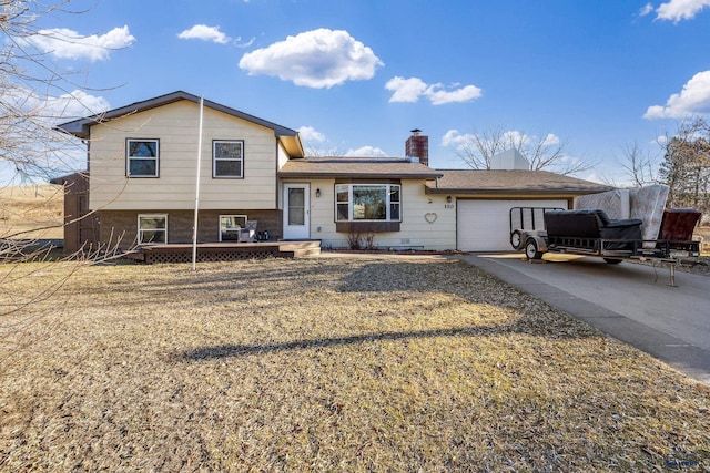 split level home with a garage