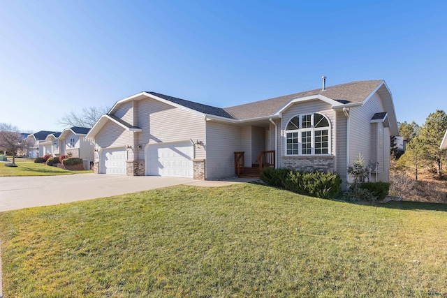 ranch-style home with a front yard and a garage