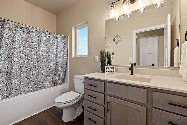 full bathroom with shower / bathtub combination with curtain, vanity, toilet, and wood-type flooring