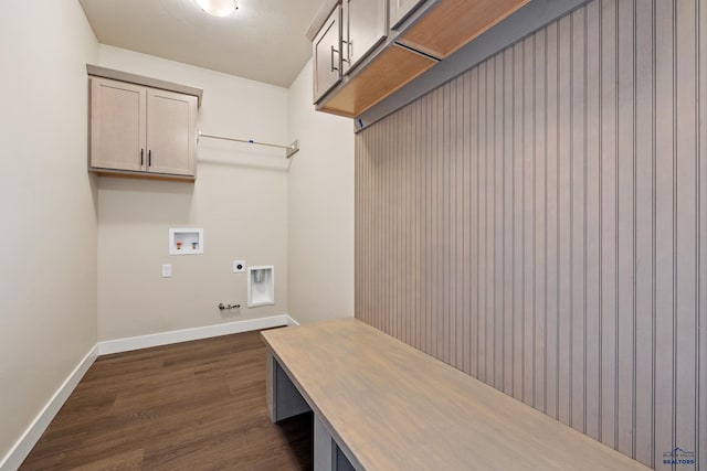 laundry area with dark wood-type flooring, cabinets, washer hookup, electric dryer hookup, and hookup for a gas dryer