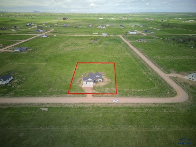 birds eye view of property featuring a rural view