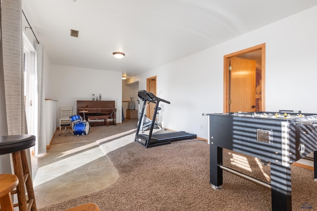 exercise area with carpet flooring