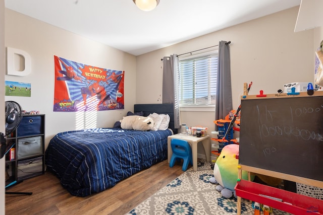 bedroom featuring wood-type flooring