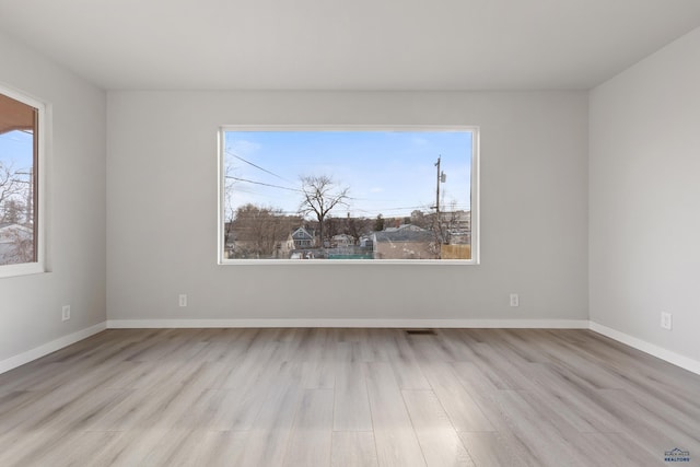 empty room featuring light hardwood / wood-style flooring