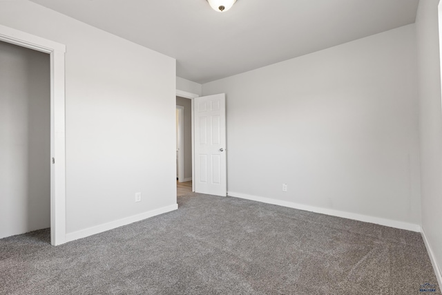 unfurnished bedroom with carpet floors