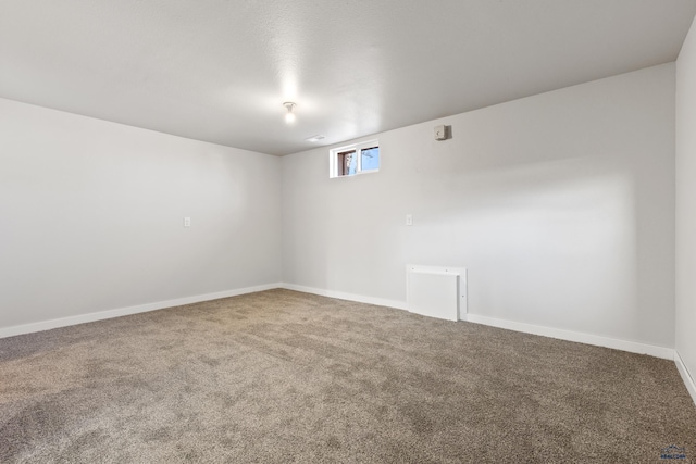 unfurnished room featuring carpet floors