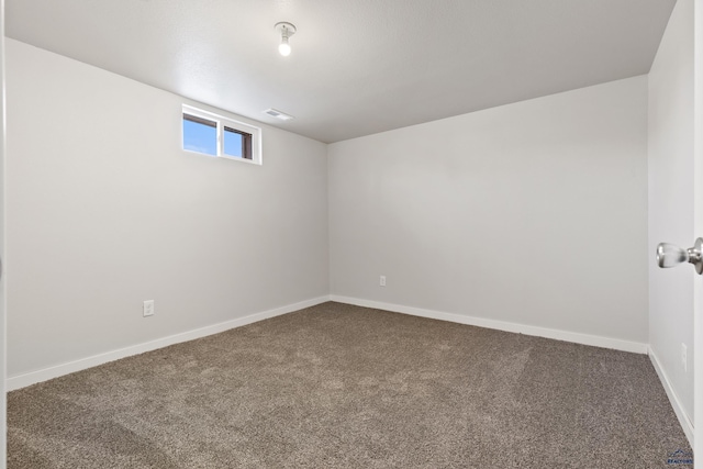 unfurnished room with carpet floors