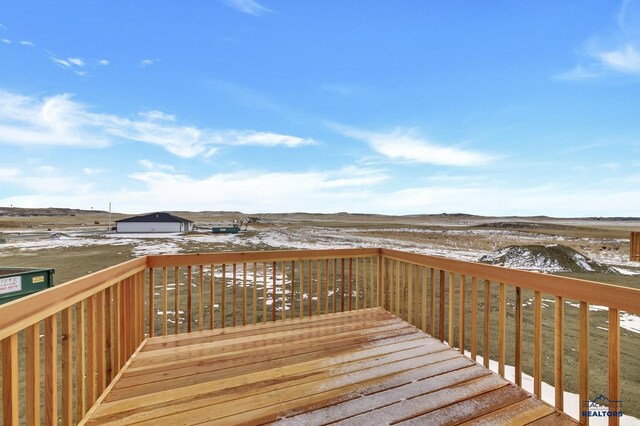 view of snow covered deck