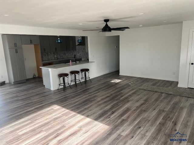 6920 Long View Rd, Rapid City, SD 57703 - living area featuring a ceiling fan, dark wood-type flooring, and recessed lighting