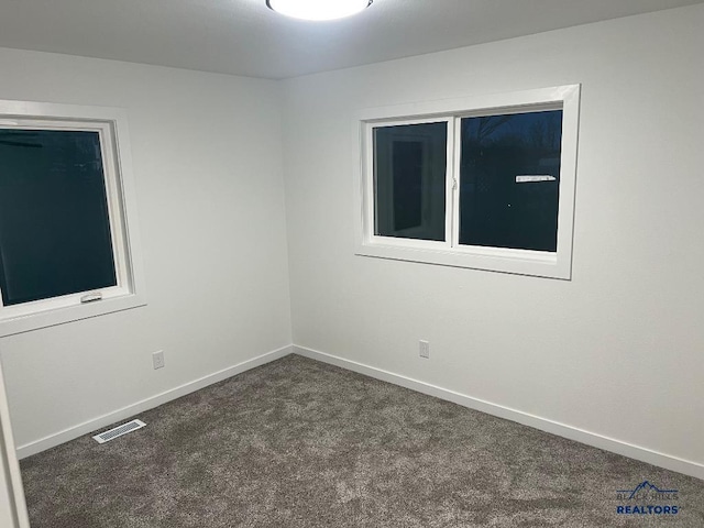 6920 Long View Rd, Rapid City, SD 57703 - carpeted empty room featuring baseboards